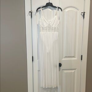 Sheer White Flowing Dress with Lace Details